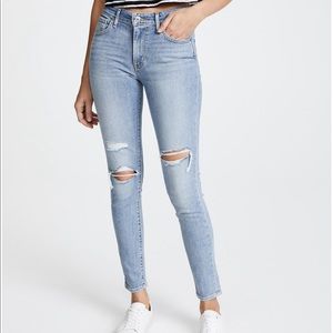 Levi’s 721 High Rise Skinny Jeans in Worn & Torn